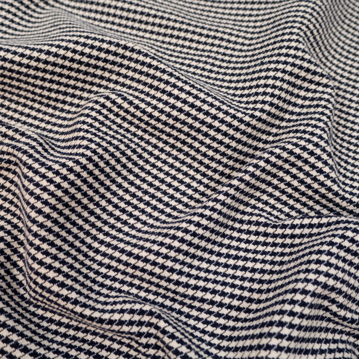 Tissu pied de poule écru et noir