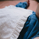 Coudre un plastron à volants pour bébé