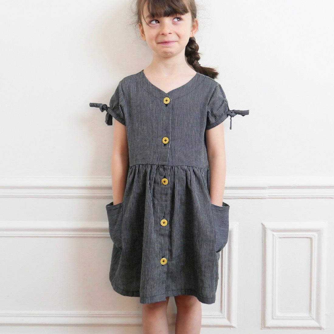 Couture de robe boutonnée